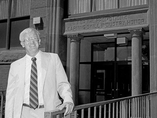 Charles W. Sorensen poses at the entrance to Bowman Hall