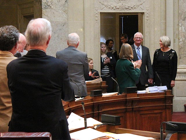 Standing ovation from the state legislature