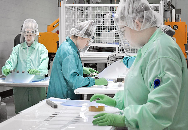 Workers at Prent in Janesville make plastic face shields to help those involved the fight against the coronavirus pandemic. / Prent photo