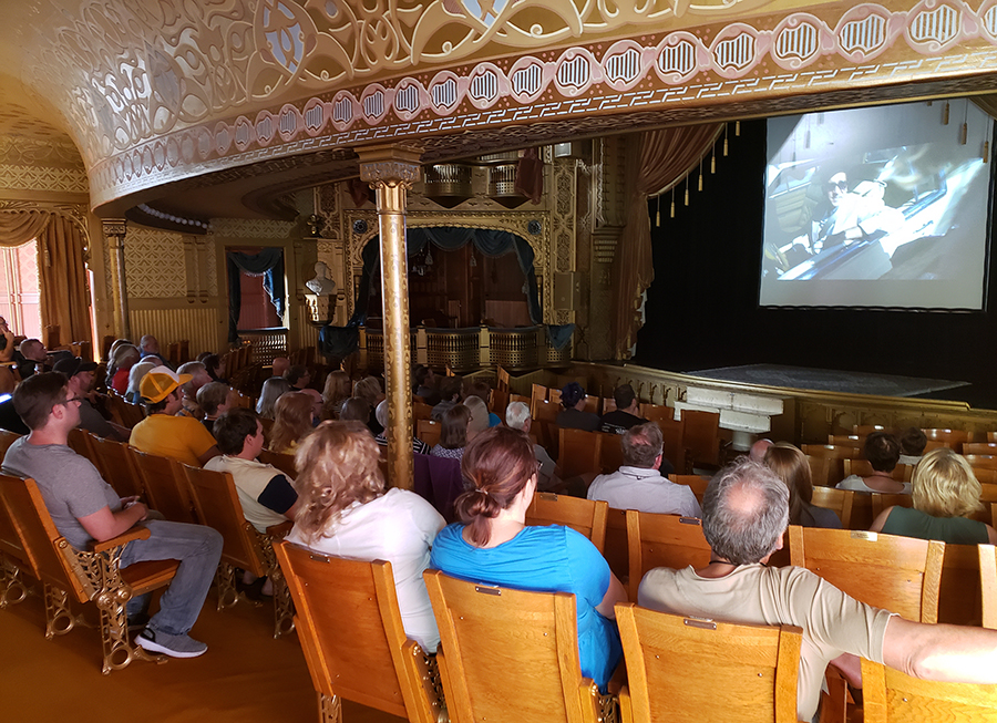 Red Cedar Film Festival attendees watch a festival film at the Mabel Tainter Center for the Arts in Menomonie.
