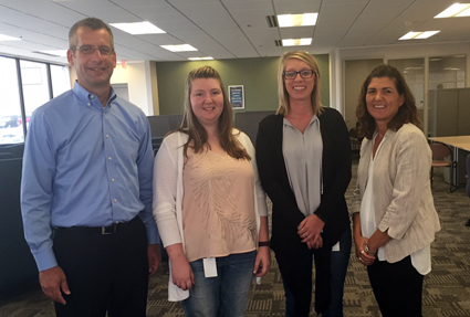  From left are Craig Yolitz, UW-Stout alumnus and a company vice president; students Kaitlin Travis and Taylor Laube; and Pat Meuers, a UW-Stout alumna and a digital marketing executive with the company.