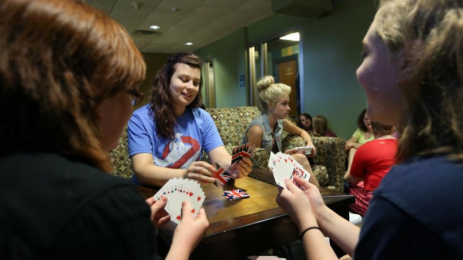 Students in the Honors College playing cards.