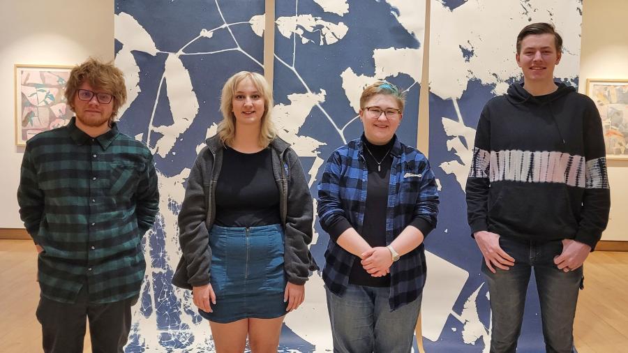 Mural designers, from left to right, Jack Gilbert, Amelia Moschkau, Bree Marconnet and Tommy Slane