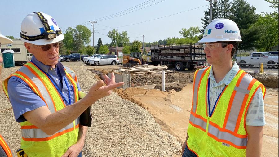 Hoyord, right, talks with Mike McGregor, a field project manager for Hoffman Planning, Design & Construction.