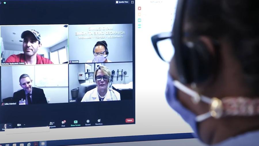 Mayo Clinic staff connect virtually with a patient in the Advanced Care at Home program.