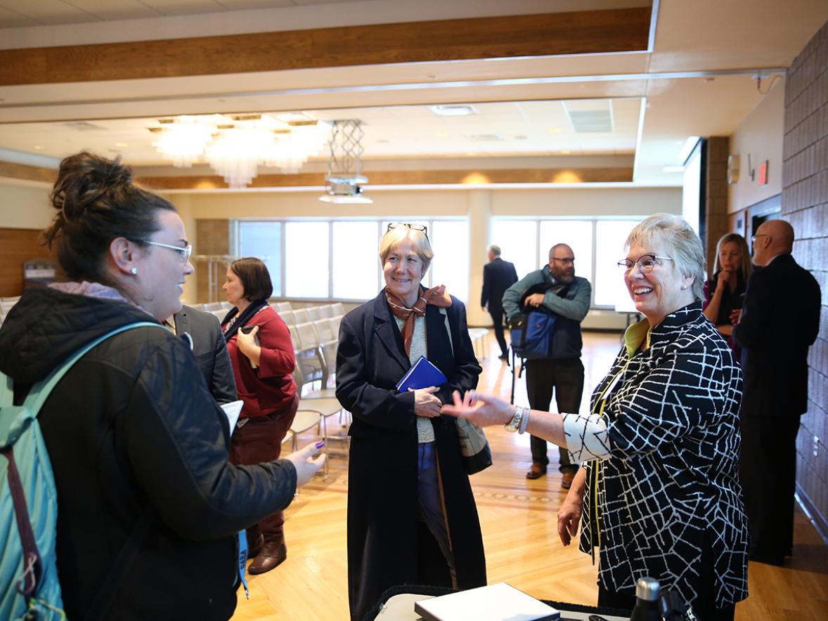 UW-Stout 2018 Cabot Executive in Residence Denise Coogan talks with a student in the ballrooms of the Memorial Student Center. Coogan, the Environmental Partnership manager at Subaru of America, spoke Wednesday, Oct. 24. / UW-Stout photos by Brett T. Roseman