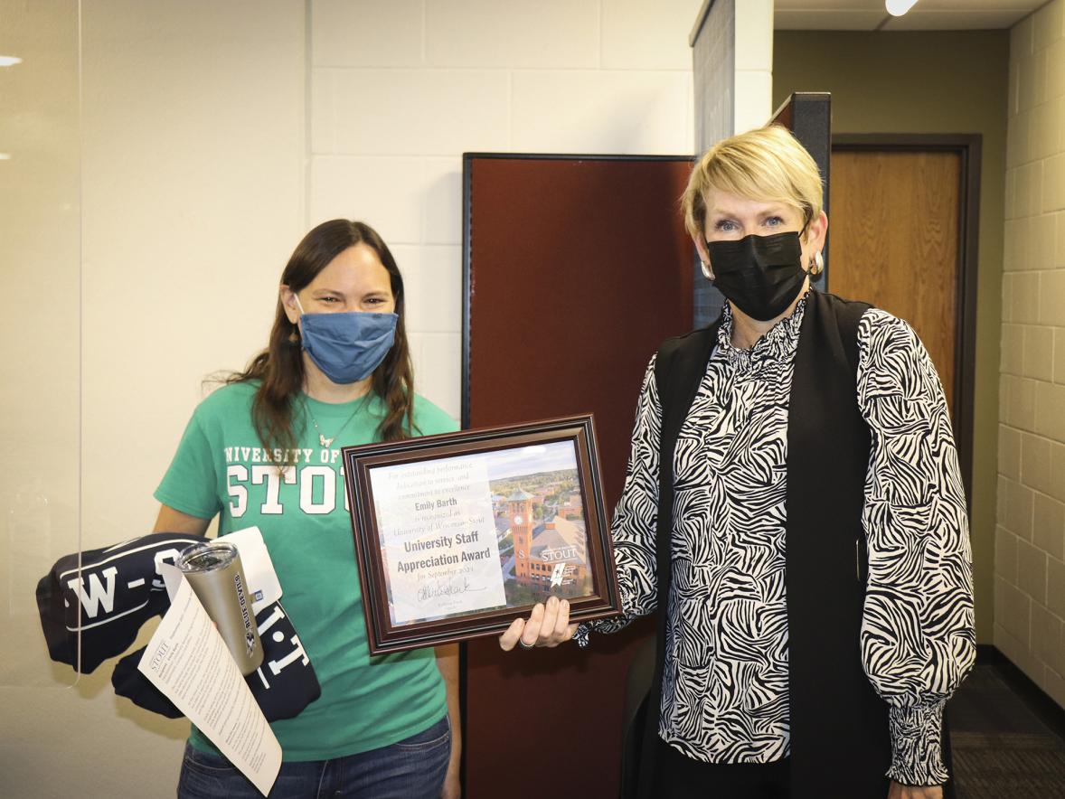 Emily Barth, at left, with Chancellor Katherine Frank receiving the September University Staff Appreciation Award.