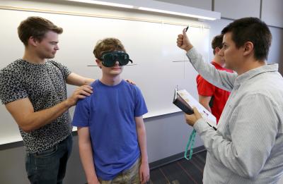 Students in psychology professor Desiree Budd's Introduction to Cognitive Neuroscience class do a lab activity utilizing perception goggles Friday, September 15, 2017.