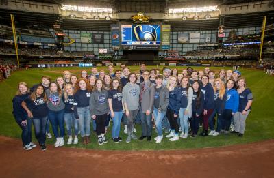 UW-Stout Symphonic Singers and Chamber Choir at Miller Park, before singing the National Anthem at a Brewers game. April 2017.