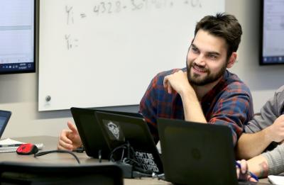 UW-Stout student in a Quantitative Research Methods course.