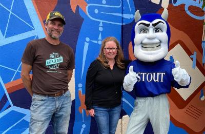 Lecturer Wade Lambrigtsen and Professor Cynthia Bland with Blaze the Blue Devil