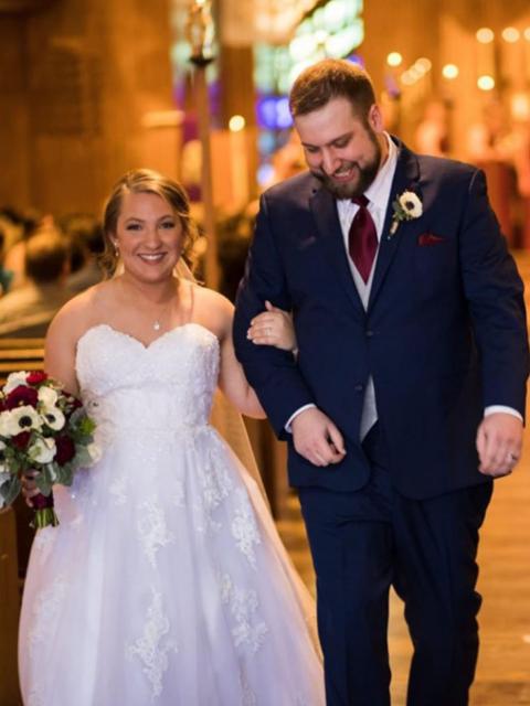 Online management student Elijah Zimmerman and his wife at their wedding.